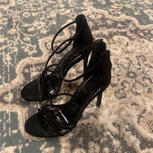 black strapped heels